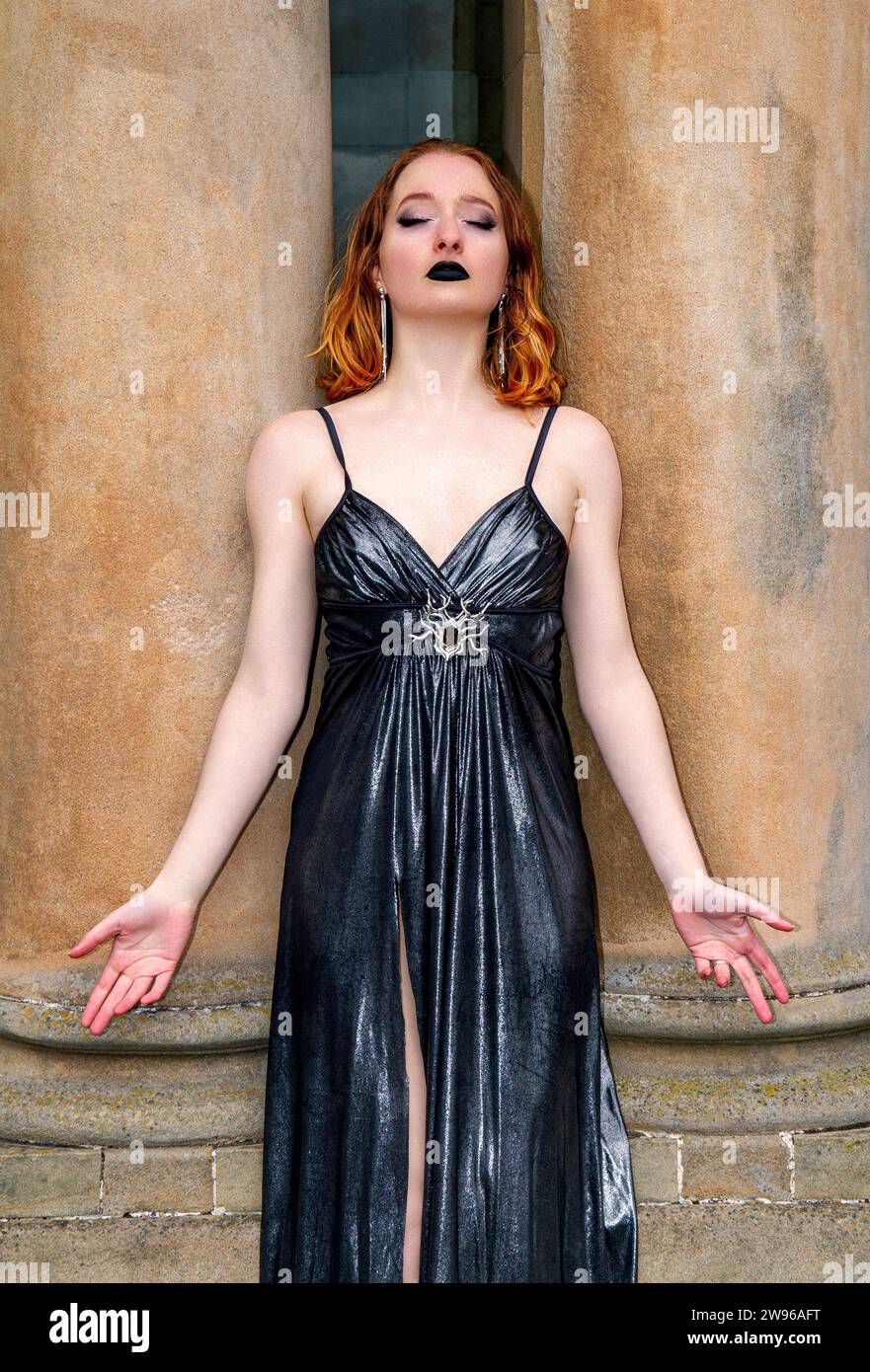 Ashley Wilkinson wearing a 1930`s style dress while modelling an Agatha Christie's Belgium detective Hercule Poirot theme at Baxter Park in Dundee, UK Stock Photo